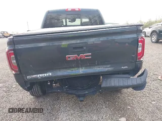 2017 GMC Sierra 1500 Denali with VIN 3GTU2PEJ5HG313350, listed as a IAAI auction lot 41968608 with 73,963 mi miles and . Bid and sale history available at DreamBid. Image 6.