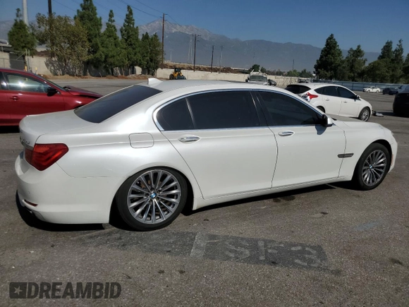 2012 BMW 7 Series 740Li with VIN WBAKB4C55CC575826, listed as a Copart auction lot 74012564 with 140,577 mi miles and Salvage Title. Bid and sale history available at carsss.com. Image 3.