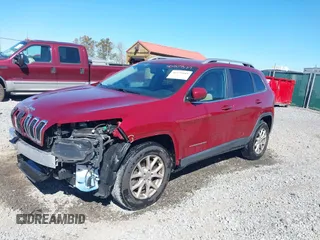2016 Jeep Cherokee Latitude with VIN 1C4PJMCB2GW153972, listed as a IAAI auction lot 40579489 with 130,176 mi miles. Bid and sale history available at carsss.com. Image 2.