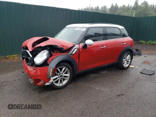 2014 MINI Countryman S with VIN WMWZC3C52EWP25379, listed as a Copart auction lot 61438355 with 76,943 mi miles and Salvage title. Bid and sale history available at DreamBid. Image 1.
