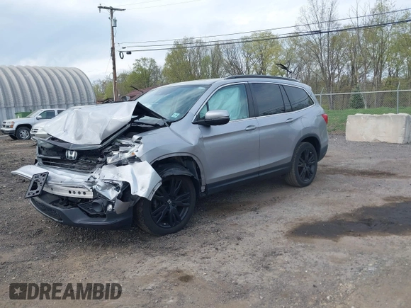 2021 Honda Pilot Special Edition with VIN 5FNYF6H20MB061334, listed as a IAAI auction lot 42123022 with 92,183 mi miles and . Bid and sale history available at DreamBid. Image 18.