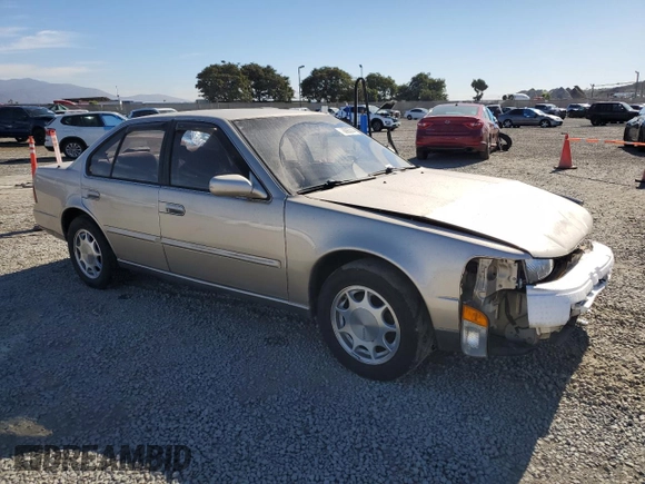 1992 Nissan Maxima z VIN JN1HJ01P6NT623546, wystawiony jako Copart lot #78095314 z przebiegiem 104 718 mil mil oraz Szkoda całkowita • Salvage title. Historia ofert i sprzedaży dostępna na DreamBid. Obrazek 4.