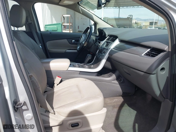 2013 Ford Edge SEL with VIN 2FMDK4JC2DBE33878, listed as a IAAI auction lot 41597848 with 216,761 mi miles. Bid and sale history available at carsss.com. Image 5.