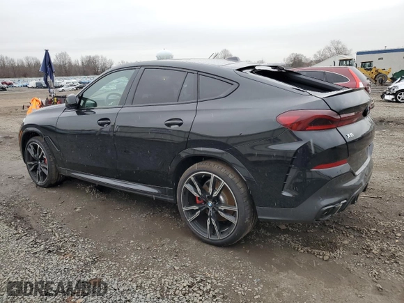 2025 BMW X6 M60i with VIN 5UX43EX02S9W76491, listed as a Copart auction lot 85033264 with 5,173 mi miles and Salvage Title. Bid and sale history available at carsss.com. Image 2.