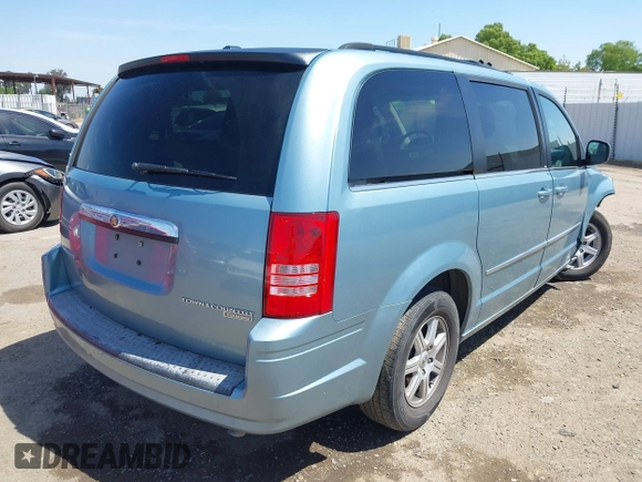 2010 Chrysler Town & Country Touring with VIN 2A4RR5D15AR278293, listed as a IAAI auction lot 41992405 with 125,529 mi miles. Bid and sale history available at carsss.com. Image 4.