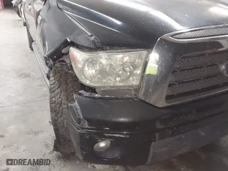 2007 Toyota Tundra LTD with VIN 5TBDV58147S490830, listed as a IAAI auction lot 41823276 with 294,520 mi miles. Bid and sale history available at carsss.com. Image 6.