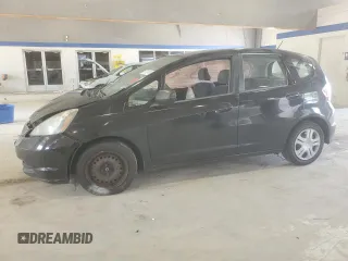 2009 Honda Fit with VIN JHMGE88289S061911, listed as a Copart auction lot 61736785 with 160,784 mi miles and Salvage title. Bid and sale history available at DreamBid. Image 1.
