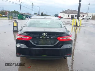 2019 Toyota Camry LE with VIN 4T1B11HK2KU263910, listed as a IAAI auction lot 42060008 with 31,433 mi miles and . Bid and sale history available at DreamBid. Image 16.
