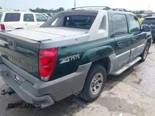 2002 Chevrolet Avalanche with VIN 3GNEC13T62G218460, listed as a IAAI auction lot 42511292 with 317,292 mi miles and . Bid and sale history available at DreamBid. Image 4.