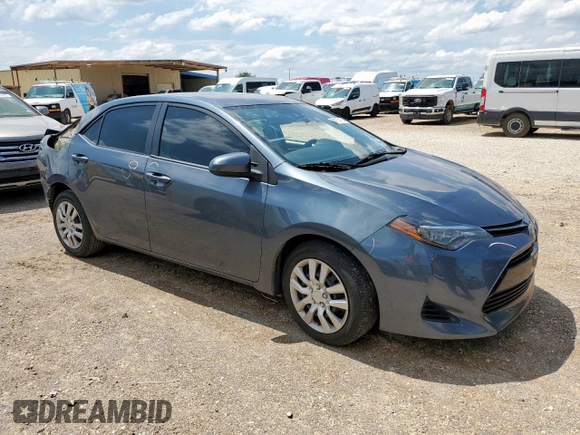 2019 Toyota Corolla L with VIN 2T1BURHEXKC242935, listed as a Copart auction lot 60103185 with 74,090 mi miles and Salvage title. Bid and sale history available at DreamBid. Image 4.