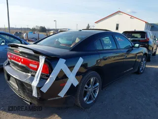 2014 Dodge Charger RT Plus with VIN 2C3CDXDT7EH202369, listed as a IAAI auction lot 41599154 with 79,294 mi miles. Bid and sale history available at carsss.com. Image 4.