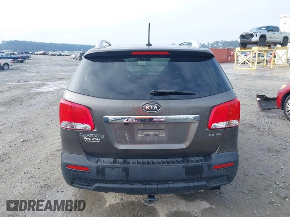 2012 Kia Sorento EX z VIN 5XYKU4A23CG302594, wystawiony jako IAAI lot #41644499 z przebiegiem 173 355 mil mil oraz . Historia ofert i sprzedaży dostępna na DreamBid. Obrazek 16.