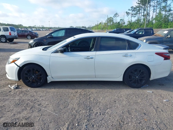 2017 Nissan Altima 2.5 SR with VIN 1N4AL3AP4HC231332, listed as a IAAI auction lot 41966946 with 151,015 mi miles. Bid and sale history available at carsss.com. Image 13.