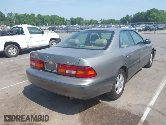 1998 Lexus ES 300 with VIN JT8BF28G3W5031533, listed as a IAAI auction lot 42132801 with 243,178 mi miles and . Bid and sale history available at DreamBid. Image 4.
