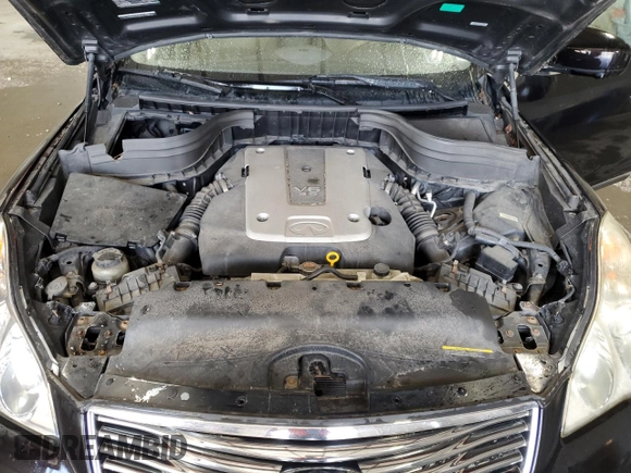 2012 Infiniti EX Journey z VIN JN1AJ0HRXCM451506, wystawiony jako Copart lot #58348595 z przebiegiem Nie podano mil oraz Szkoda całkowita • Salvage title. Historia ofert i sprzedaży dostępna na DreamBid. Obrazek 12.