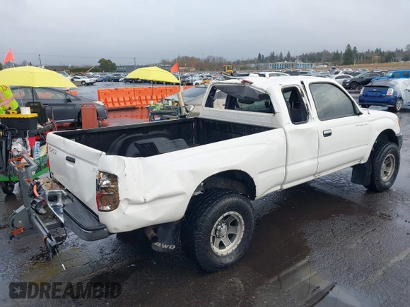 1999 Toyota Tacoma with VIN 4TAWN72N6XZ452890, listed as a IAAI auction lot 41485263 with 201,974 mi miles and . Bid and sale history available at DreamBid. Image 6.