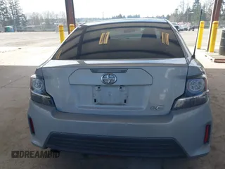 2014 Scion tC with VIN JTKJF5C71E3069593, listed as a IAAI auction lot 41901040 with 86,231 mi miles. Bid and sale history available at carsss.com. Image 16.