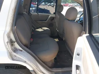 2002 Jeep Grand Cherokee Laredo with VIN 1J4GX48S32C134911, listed as a IAAI auction lot 42323138 with 156,852 mi miles and . Bid and sale history available at DreamBid. Image 8.