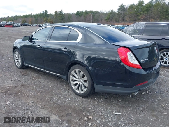 2014 Lincoln MKS with VIN 1LNHL9EK0EG601444, listed as a IAAI auction lot 41849160 with 164,791 mi miles. Bid and sale history available at carsss.com. Image 3.