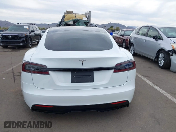 2021 Tesla Model S Long Range with VIN 5YJSA1E57MF453815, listed as a IAAI auction lot 41818700 with 51,176 mi miles and . Bid and sale history available at DreamBid. Image 17.