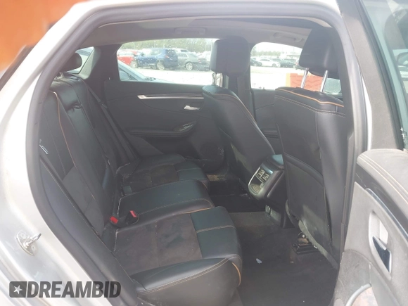 2014 Chevrolet Impala LT with VIN 2G1125S39E9313542, listed as a IAAI auction lot 41988420 with 227,093 mi miles and . Bid and sale history available at DreamBid. Image 8.