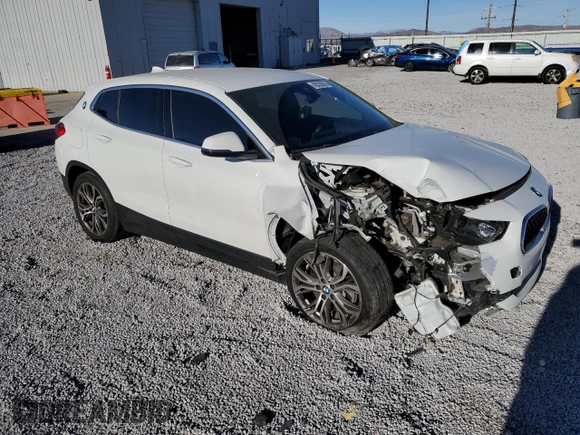 2020 BMW X2 xDrive28i with VIN WBXYJ1C09L5N87648, listed as a Copart auction lot 42029595 with 42,688 mi miles and Salvage Title. Bid and sale history available at carsss.com. Image 4.