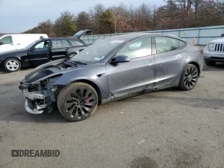 2023 Tesla Model 3 Performance z VIN 5YJ3E1EC4PF488873, wystawiony jako Copart lot #78991994 z przebiegiem 26 452 mil mil oraz Szkoda całkowita • Salvage title. Historia ofert i sprzedaży dostępna na DreamBid. Obrazek 1.