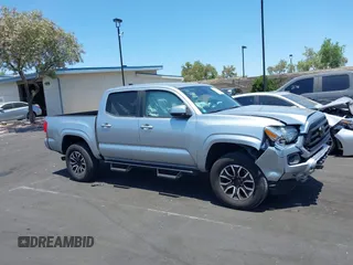 2022 Toyota Tacoma SR with VIN 3TYAX5GN4NT037625, listed as a IAAI auction lot 42382411 with 49,703 mi miles and . Bid and sale history available at DreamBid. Image 14.