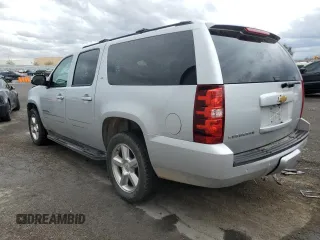 2013 Chevrolet Suburban LT with VIN 1GNSCJE07DR305437, listed as a Copart auction lot 55346605 with 160,518 mi miles and Salvage title. Bid and sale history available at DreamBid. Image 2.