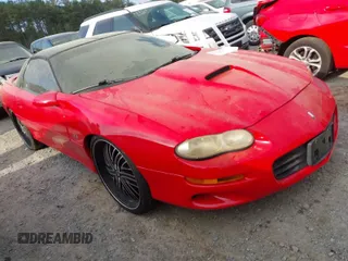 2002 Chevrolet Camaro Z28 z VIN 2G1FP22G522140602, wystawiony jako IAAI lot #41930950 z przebiegiem 156 098 mil mil oraz . Historia ofert i sprzedaży dostępna na DreamBid. Obrazek 1.