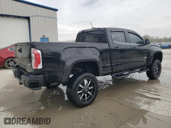 2015 GMC Canyon 4WD SLE with VIN 1GTG6BE30F1185696, listed as a Copart auction lot 51091255 with 173,322 mi miles and Salvage Title. Bid and sale history available at carsss.com. Image 3.