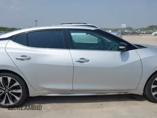 2017 Nissan Maxima SR z VIN 1N4AA6AP9HC397126, wystawiony jako IAAI lot #42291477 z przebiegiem 115 201 mil mil oraz . Historia ofert i sprzedaży dostępna na DreamBid. Obrazek 13.