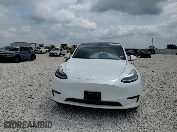 2020 Tesla Model Y Long Range z VIN 5YJYGDEE7LF010461, wystawiony jako Copart lot #55184315 z przebiegiem 88 285 mil mil oraz Szkoda całkowita • Salvage title. Historia ofert i sprzedaży dostępna na DreamBid. Obrazek 13.