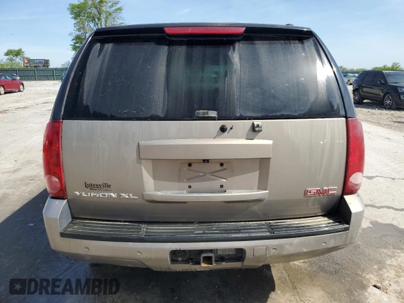 2007 GMC Yukon XL SLT z VIN 1GKFK16387J173009, wystawiony jako Copart lot #54010965 z przebiegiem 264 446 mil mil oraz Czysty tytuł • Clean title. Historia ofert i sprzedaży dostępna na DreamBid. Obrazek 6.