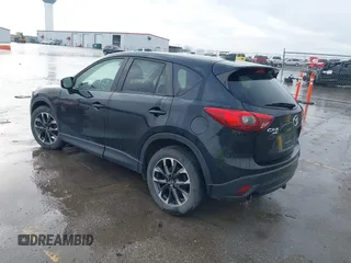 2016 Mazda CX-5 Grand Touring with VIN JM3KE4DY3G0769448, listed as a IAAI auction lot 41947725 with 154,051 mi miles and . Bid and sale history available at carsss.com. Image 3.