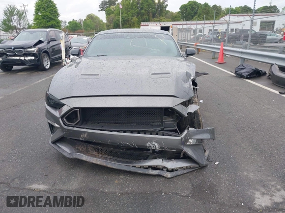 2021 Ford Mustang GT z VIN 1FA6P8CF0M5105060, wystawiony jako IAAI lot #41967671 z przebiegiem 27 626 mil mil oraz . Historia ofert i sprzedaży dostępna na DreamBid. Obrazek 12.