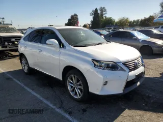 2015 Lexus RX 450h with VIN 2T2ZB1BAXFC003138, listed as a Copart auction lot 84299114 with 105,663 mi miles and Salvage Title. Bid and sale history available at DreamBid. Image 4.