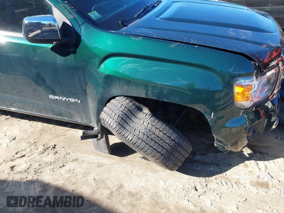 2015 GMC Canyon 4WD SLT with VIN 1GTG6CE35F1273343, listed as a IAAI auction lot 41683758 with 77,911 mi miles. Bid and sale history available at carsss.com. Image 6.