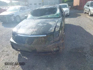 2007 Cadillac CTS z VIN 1G6DP577270133840, wystawiony jako IAAI lot #42301505 z przebiegiem Nie podano mil oraz . Historia ofert i sprzedaży dostępna na DreamBid. Obrazek 12.
