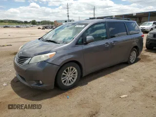 2011 Toyota Sienna XLE AAS with VIN 5TDYK3DCXBS037804, listed as a Copart auction lot 62162295 with 227,534 mi miles and Clean title. Bid and sale history available at DreamBid. Image 1.