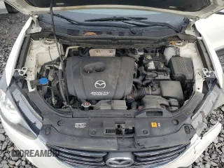 2016 Mazda CX-5 Sport с VIN JM3KE4BY4G0899953, выставлен на аукционе Copart как лот 57269035 с пробегом 196 158 миль миль и Списание • Salvage title. История ставок и продаж доступна на DreamBid. Изображение 12.