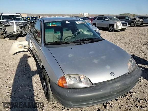2001 Suzuki Swift GA z VIN 2S2AB21H516602339, wystawiony jako Copart lot #50135584 z przebiegiem 142 476 mil mil oraz Szkody całkowita. Historia ofert i sprzedaży dostępna na DreamBid. Obrazek 10.