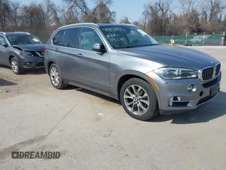 2015 BMW X5 xDrive35i with VIN 5UXKR0C53F0K60910, listed as a IAAI auction lot 41857733 with 153,583 mi miles. Bid and sale history available at carsss.com. Image 1.