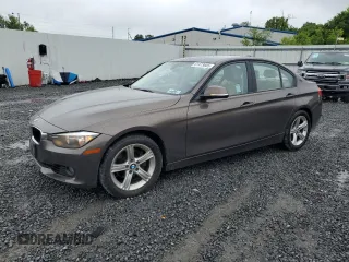2014 BMW 3 Series 328i with VIN WBA3C1C59EK112967, listed as a Copart auction lot 61473605 with 151,905 mi miles and Clean title. Bid and sale history available at DreamBid. Image 1.