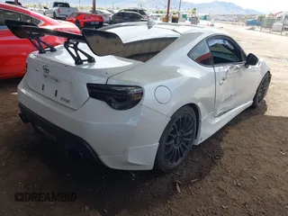 2014 Scion FR-S with VIN JF1ZNAA1XE8708258, listed as a IAAI auction lot 41809222 with 109,325 mi miles and . Bid and sale history available at DreamBid. Image 4.
