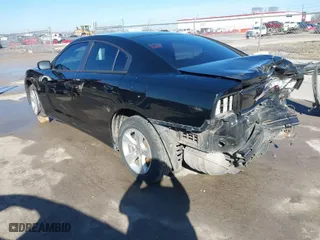 2014 Dodge Charger SE with VIN 2C3CDXBG6EH234509, listed as a IAAI auction lot 41618980 with 152,654 mi miles. Bid and sale history available at carsss.com. Image 3.