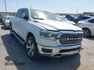 2020 Ram 1500 Laramie with VIN 1C6SRFJT0LN151641, listed as a IAAI auction lot 41852284 with 51,490 mi miles and . Bid and sale history available at DreamBid. Image 1.