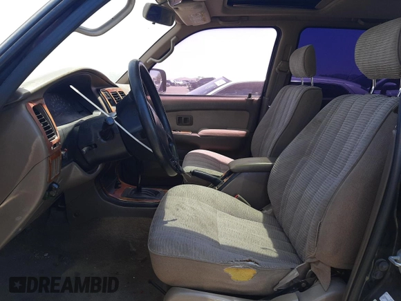 1998 Toyota 4Runner SR5 z VIN JT3GN86R6W0071589, wystawiony jako Copart lot #58624665 z przebiegiem 260 156 mil mil oraz Czysty tytuł • Clean title. Historia ofert i sprzedaży dostępna na DreamBid. Obrazek 7.