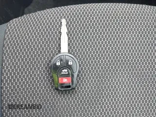 2015 Nissan Versa SV with VIN 3N1CN7APXFL957933, listed as a IAAI auction lot 41601299 with 54,799 mi miles. Bid and sale history available at carsss.com. Image 11.
