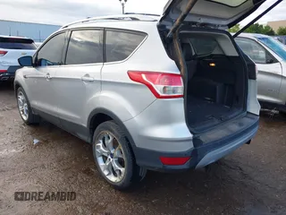 2013 Ford Escape Titanium with VIN 1FMCU0J90DUC13877, listed as a IAAI auction lot 42370172 with 119,745 mi miles and . Bid and sale history available at DreamBid. Image 3.